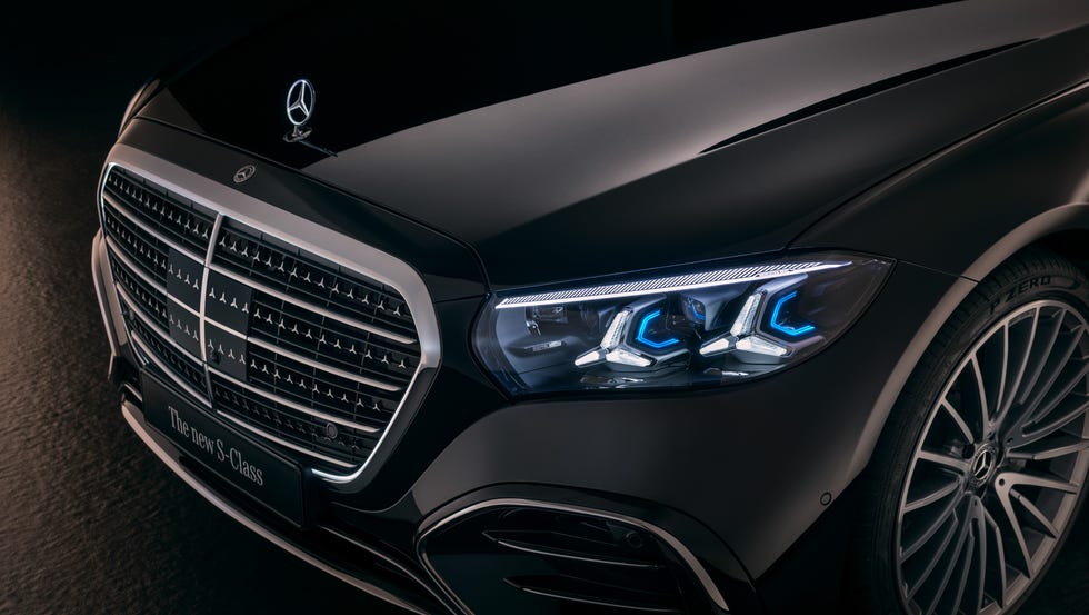 The rear seating area of the 2027 S-Class with deep white leather and executive seating package.