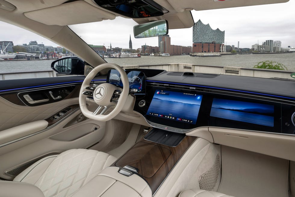 Interior view of the Mercedes S-Class featuring Macchiato Beige Nappa leather and refined wood trim.
