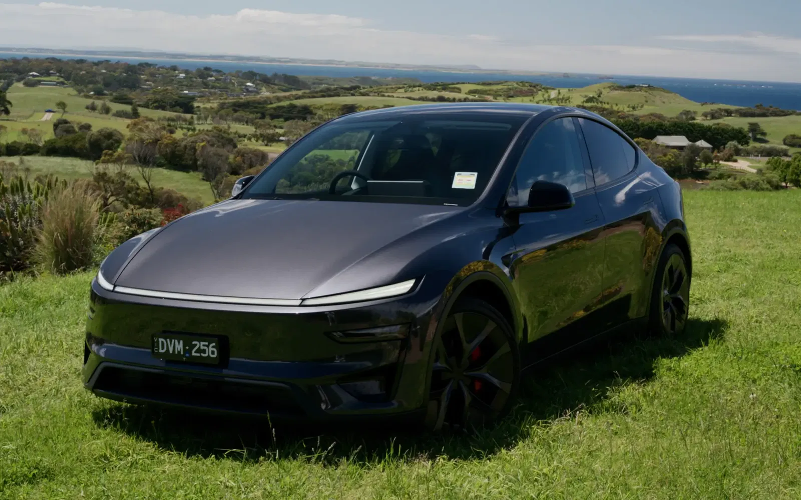 Close-up of the horizontal front light bar on the 2026 Tesla Model Y.