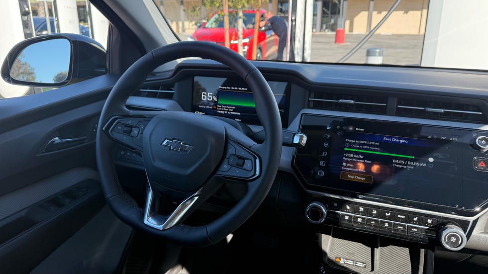 Frontal view of the 2027 Chevrolet Bolt EV parked on a road.