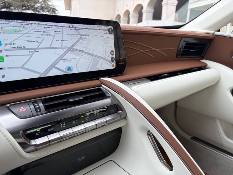 Close-up of Lexus LC 500 leather interior craftsmanship and stitching.