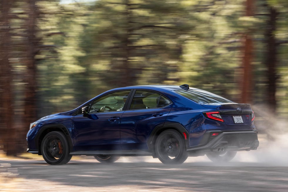 Side profile of the 2025 Subaru WRX tS showcasing its performance wheels and sporty silhouette.