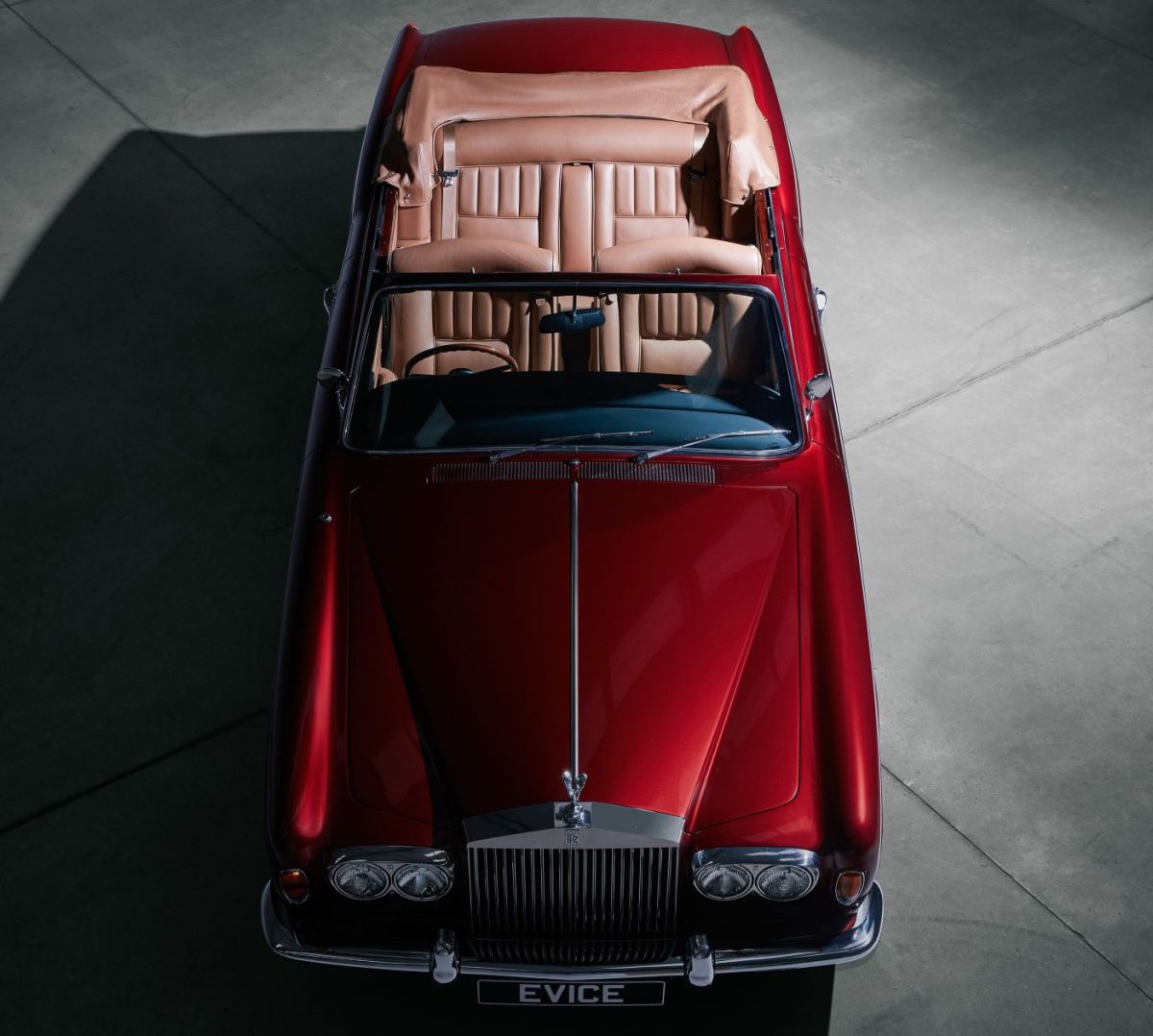 Close-up front view of the Halcyon Rolls-Royce Corniche EV highlighting the iconic grille.