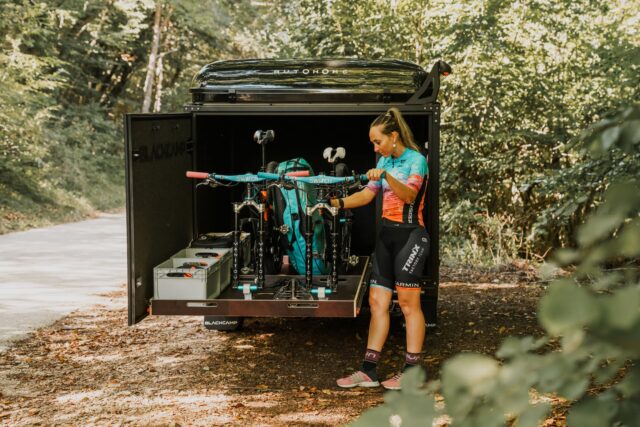 Interior view of the Blackcamp Freeda trailer with mountain bikes stored inside