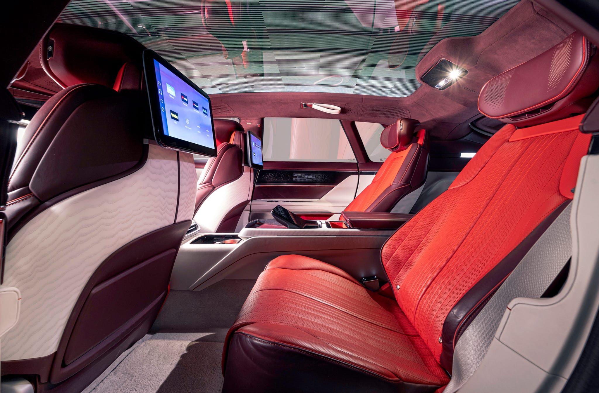 The rear passenger cabin of the Cadillac Celestiq with plush leather seating and individual climate controls.
