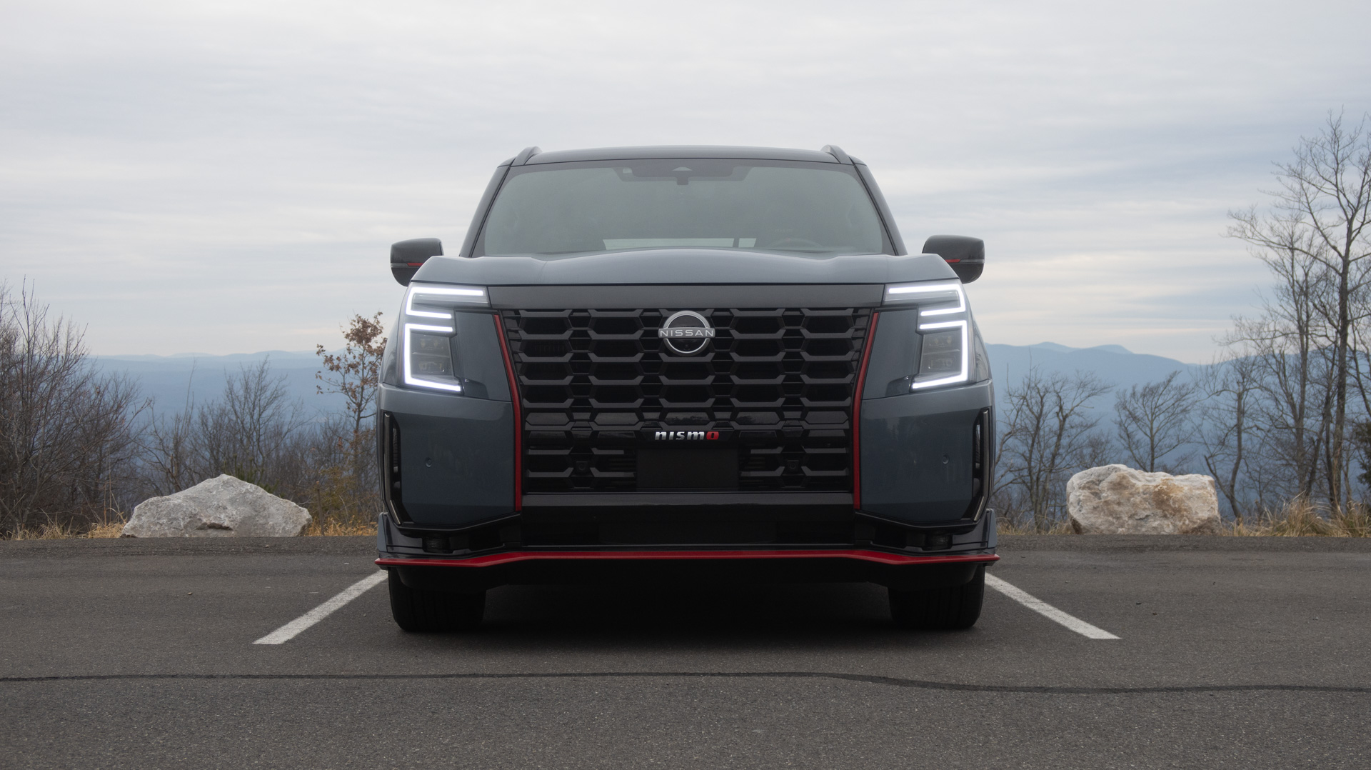 Close-up of the aggressive front fascia and grille of the 2026 Nissan Armada NISMO.