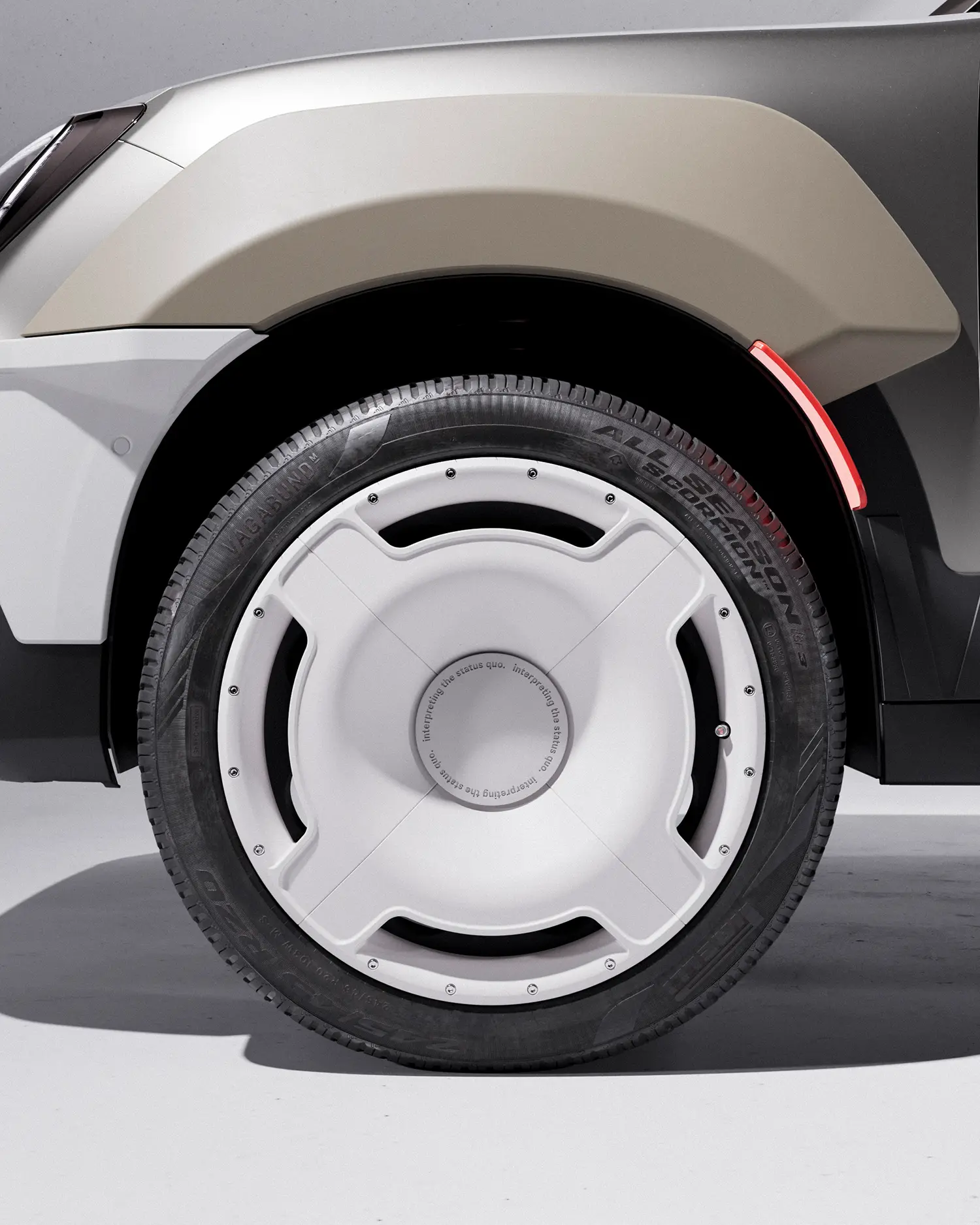Close-up of a 20-inch MINI wheel with 3D-printed aerodynamic covers designed to look like speaker diaphragms.