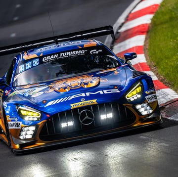 Race cars competing at the ADAC Ravenol 24h Nürburgring event.