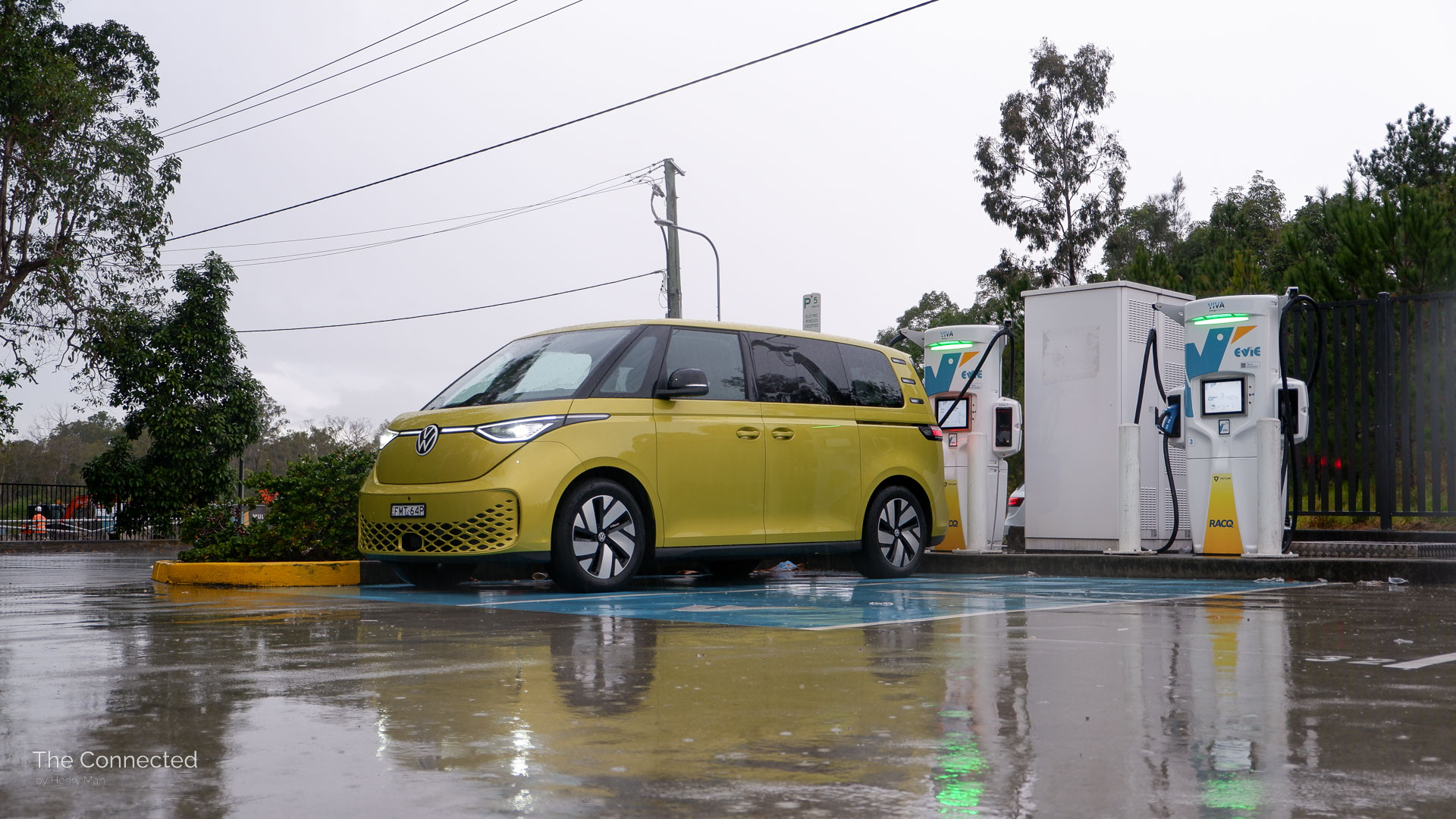 A Volkswagen ID.Buzz Pro charging at a public ultra-fast DC charging station.