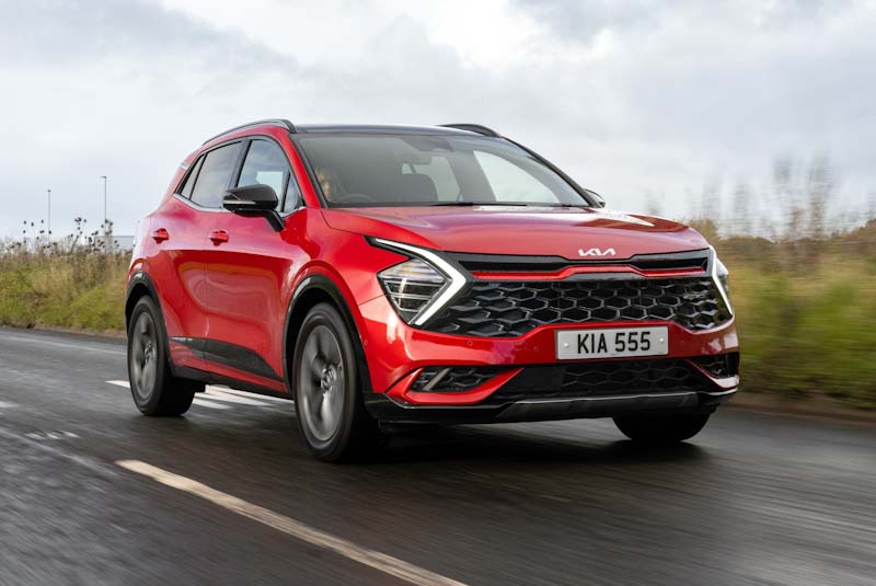 A Kia Sportage Hybrid SUV shown from a rear-quarter angle.