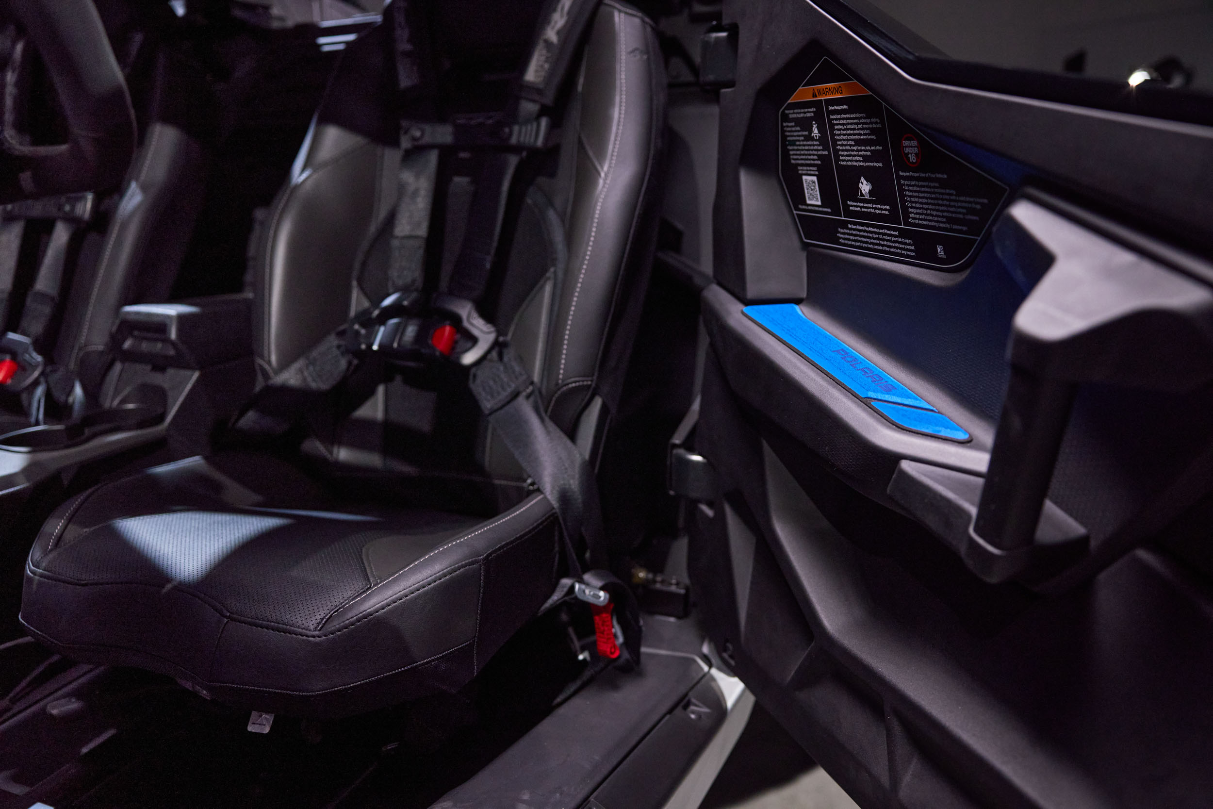 Close-up of the Velocity Blue paint and custom GatorStep interior accents on the Ultra Edition.