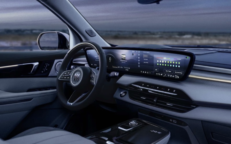 Luxurious interior of the 2026 Buick Enclave highlighting the 30-inch diagonal display and floating console