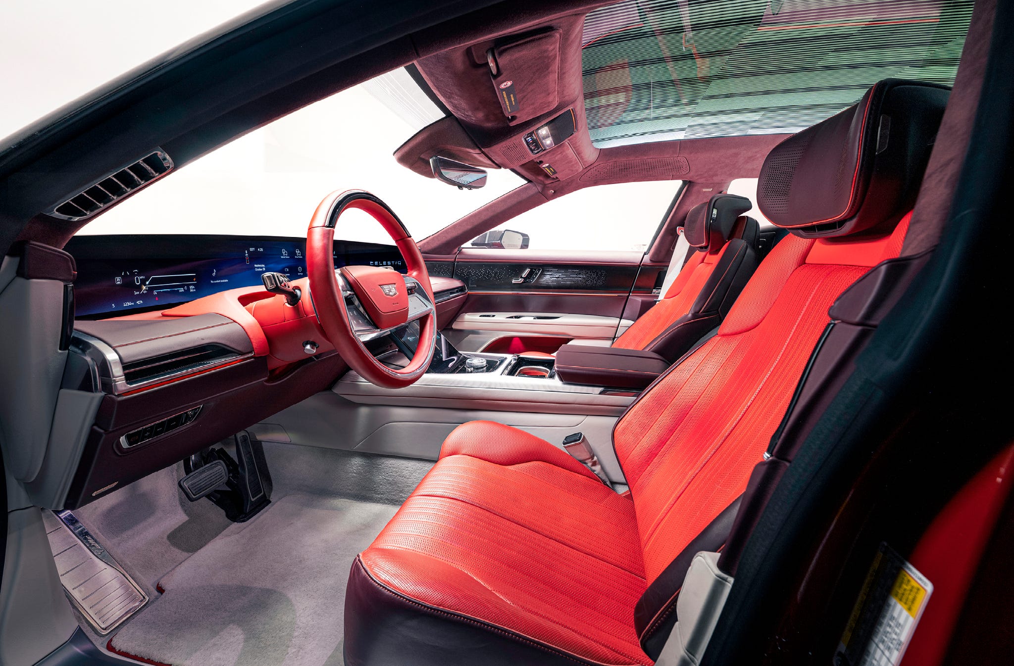 The interior dashboard of the Cadillac Celestiq featuring a continuous 55-inch high-definition screen.