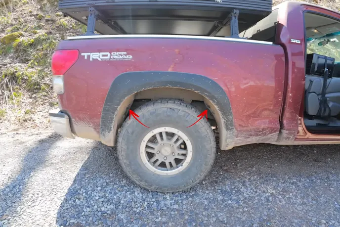 Close-up of a 17-inch TRD Rock Warrior wheel with a Nitto Recon Grappler tire.