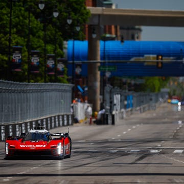 IMSA WeatherTech Sportscar Championship cars racing on a street circuit.