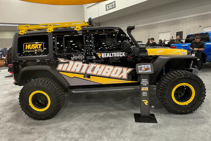 Front view of the life-size Matchbox Jeep Wrangler showing the custom livery and off-road components.
