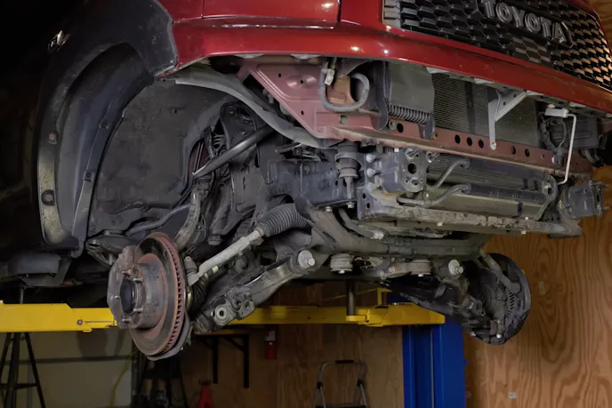 Detail shot of the TRD Pro internal bypass suspension components installed on the Tundra.
