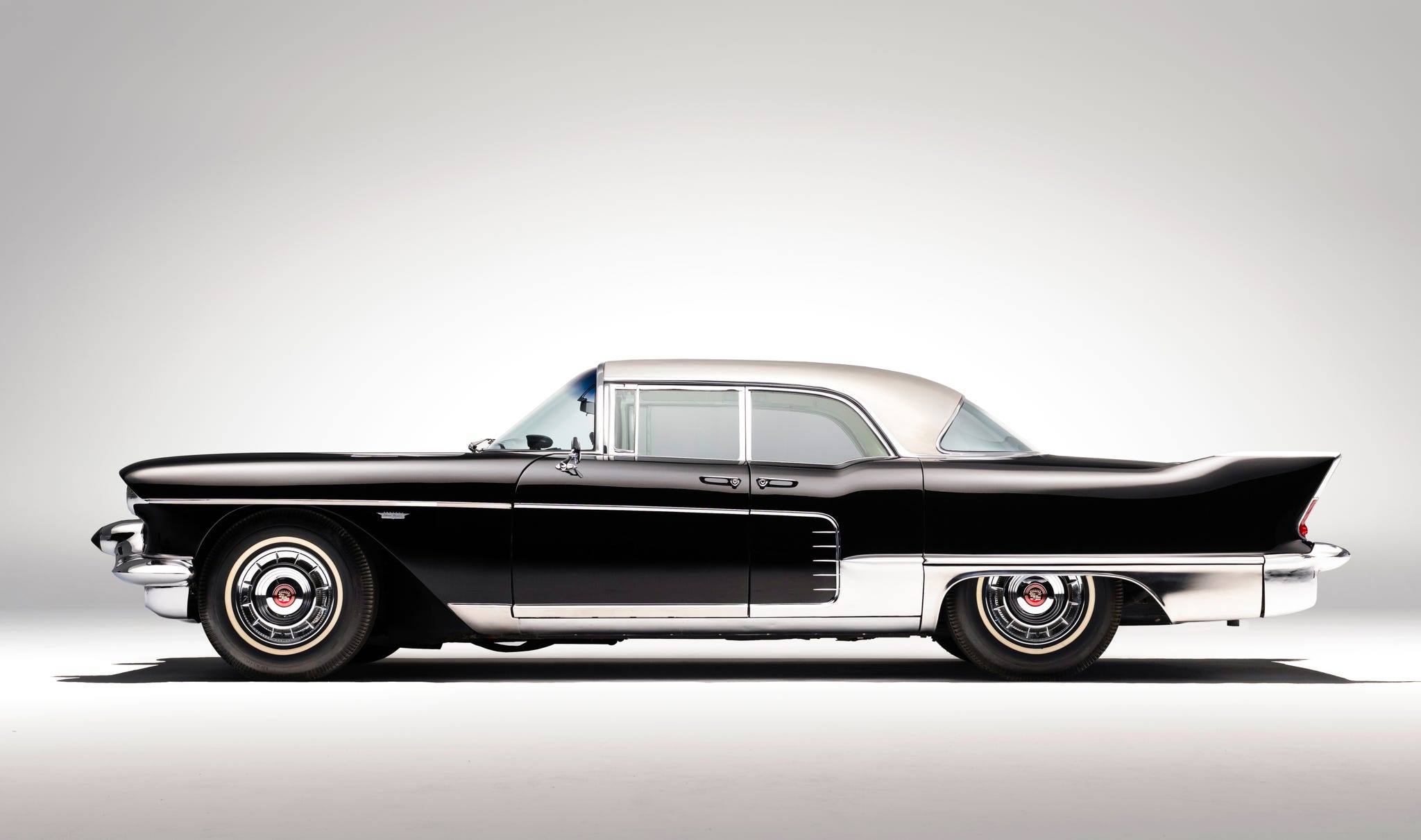 A classic 1957 Cadillac Eldorado Brougham in a light blue shade.