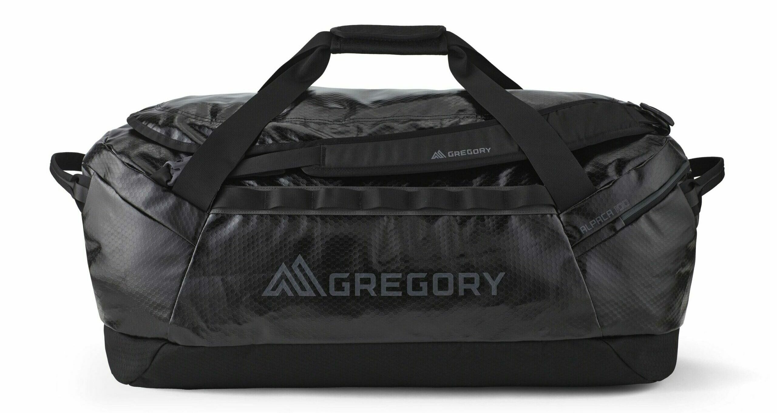 A black Gregory Alpaca 100 duffel bag showing its rugged exterior.