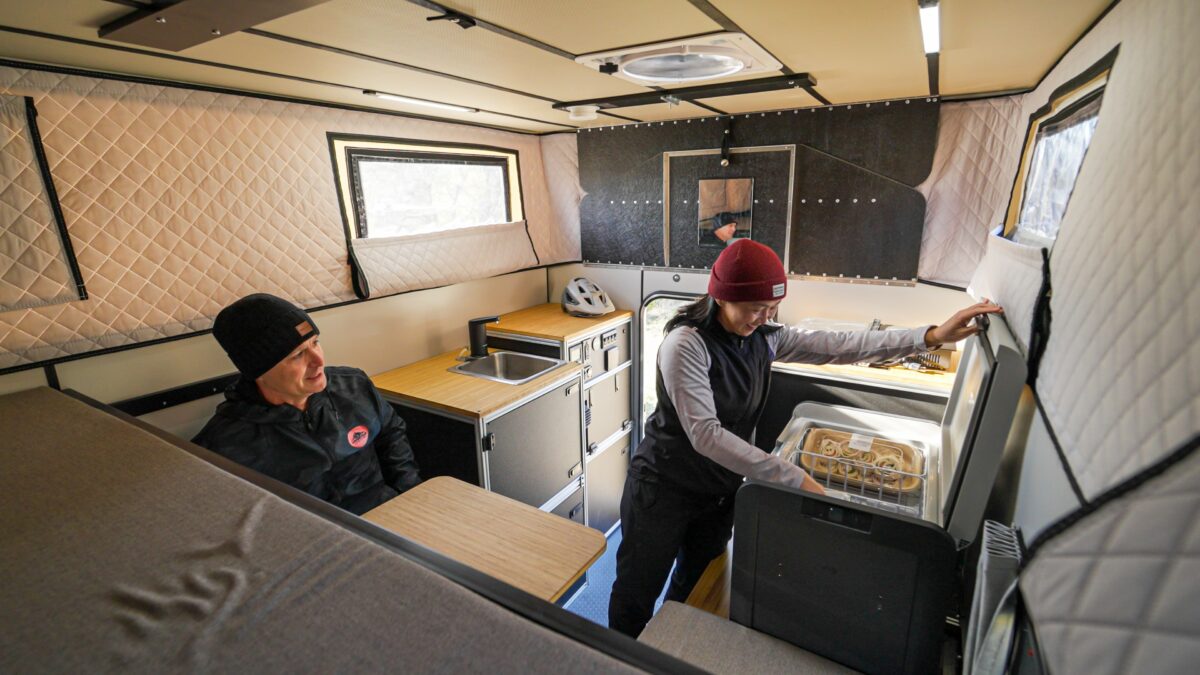 Toyota Tundra camper setup with mountain bikes parked in a mountainous region