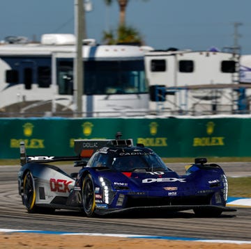 An IMSA WeatherTech SportsCar Championship GTP prototype racing during the Twelve Hours of Sebring.
