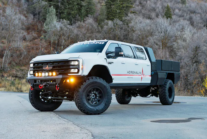 Detail shot of 43-inch Michelin X Force ZL tires and DBL Design wheels on the Ford F-550.