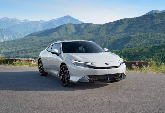 Static front view of the 2026 Honda Prelude in Boost Blue Pearl paint.
