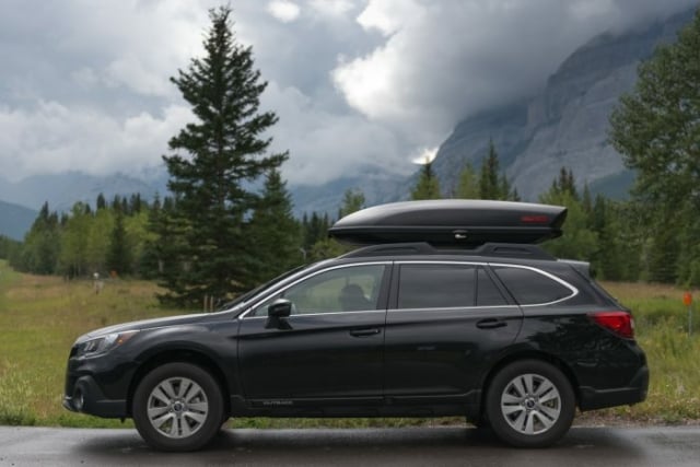 Side view of Yakima SkyBox 16 on roof rails.