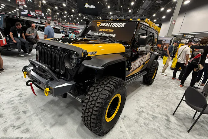 Side profile of the full-scale custom Matchbox Jeep Wrangler in an outdoor setting.