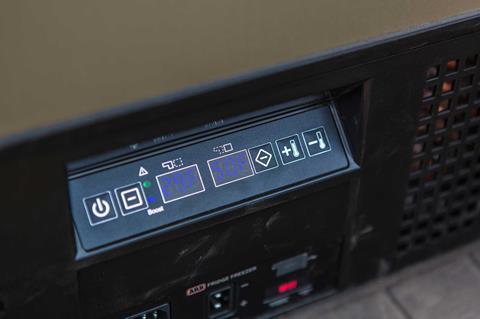Close-up of the digital control panel and temperature display on an ARB Zero portable fridge.