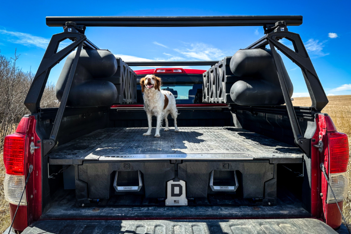 A truck bed featuring a combination of the DECKED drawer system and a Leitner FORGED rack.