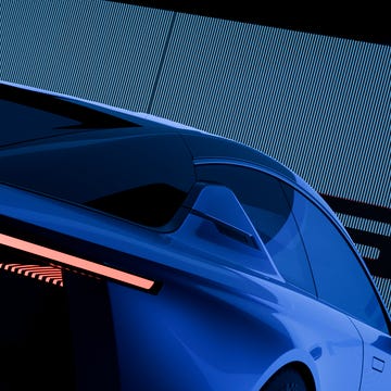 Rear view of a modern SUV with sharp, illuminated LED light signatures.