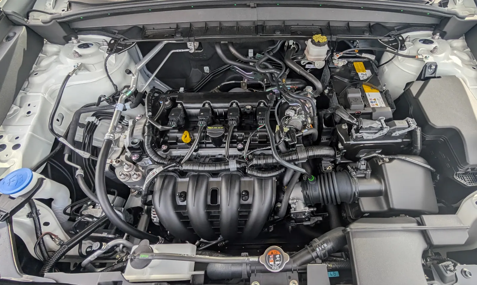 The SkyActiv-G 2.5L four-cylinder engine inside the engine bay of the 2026 Mazda CX-5.