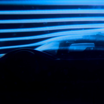 A close-up teaser of a Ford performance racing vehicle.