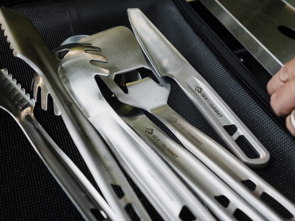 The Sea to Summit Detour cook set completely collapsed into a flat, compact stack.