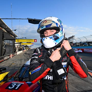 Race cars competing in the IMSA WeatherTech Sportscar Championship at Watkins Glen