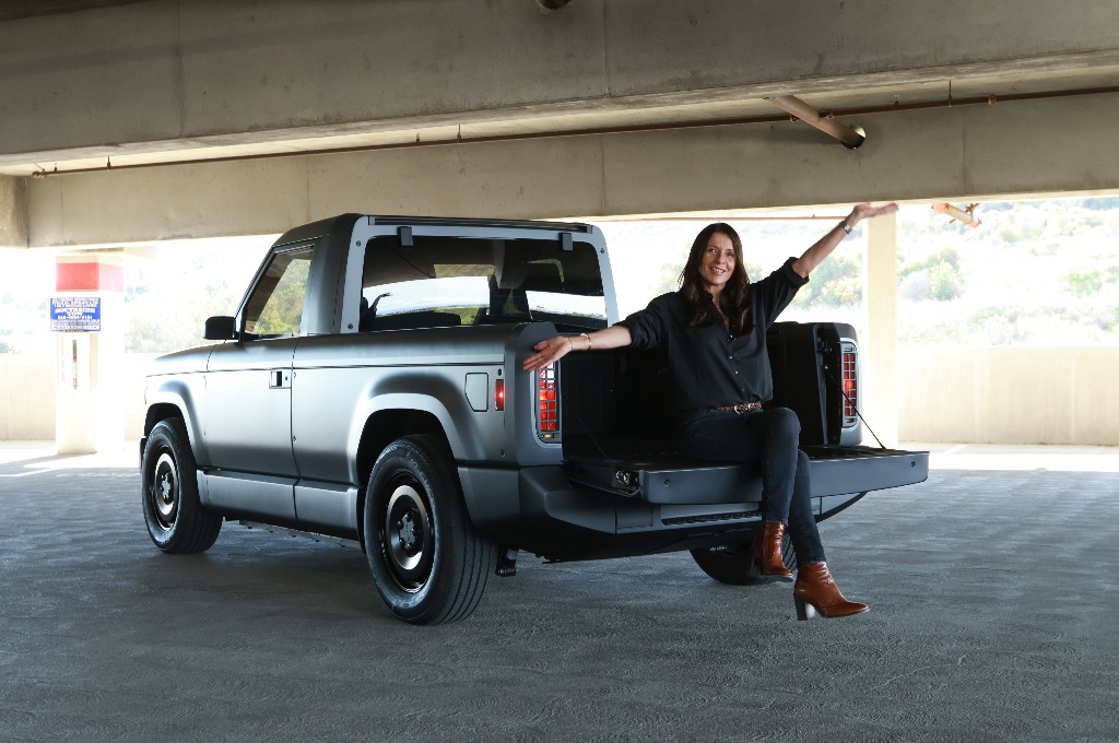 A close-up outdoor shot of the Slate Auto pickup showing the texture of its plastic body panels.