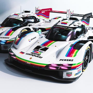 A white Porsche 963 race car with a colorful Apple Computer tribute livery.