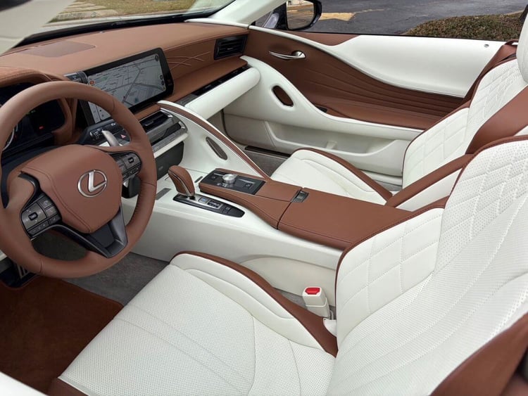 Interior cabin of the Lexus LC 500 in Saddle Tan and White.
