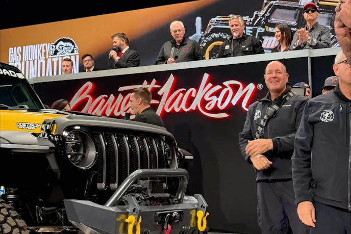 Richard Rawlings and the RealTruck team celebrating the auction result.