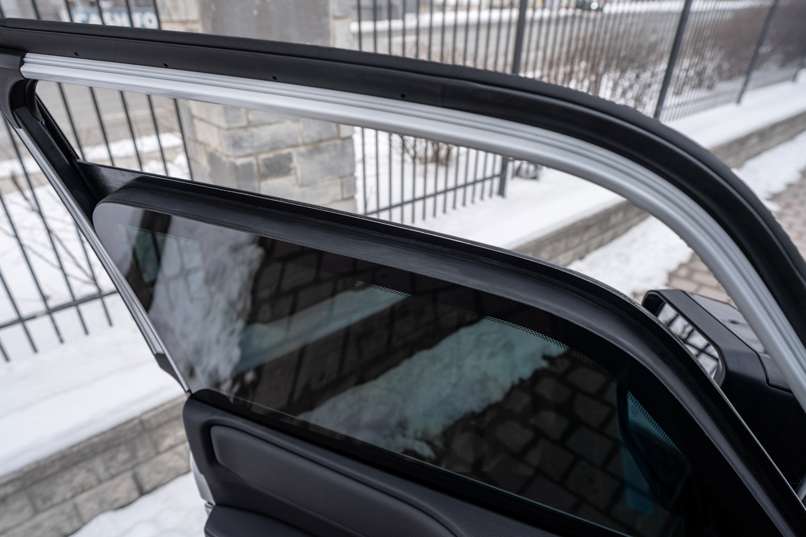 The underside of an armored vehicle showing heavy steel plating and reinforced chassis components.