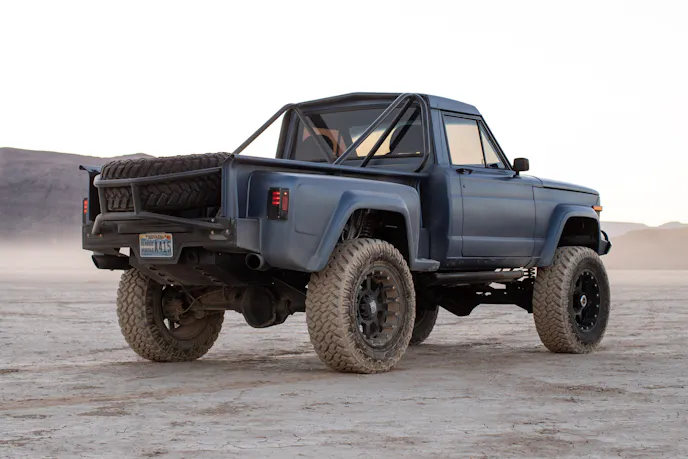 Radflo 2.5 remote-reservoir coilovers and triple-bypass shocks on a custom truck chassis.