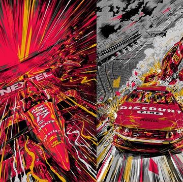 A dynamic racing scene with high-performance cars blurred to show speed.