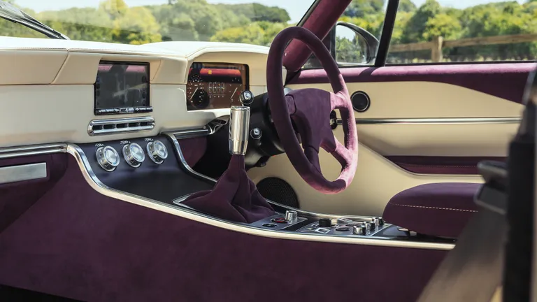 Interior shot of the TWR Supercat cockpit featuring Bridge of Weir leather and digital-analogue displays.