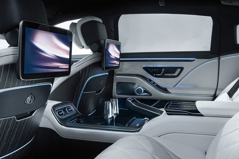 The 2027 Mercedes-Maybach S-Class parked in front of a modern luxury architectural building.