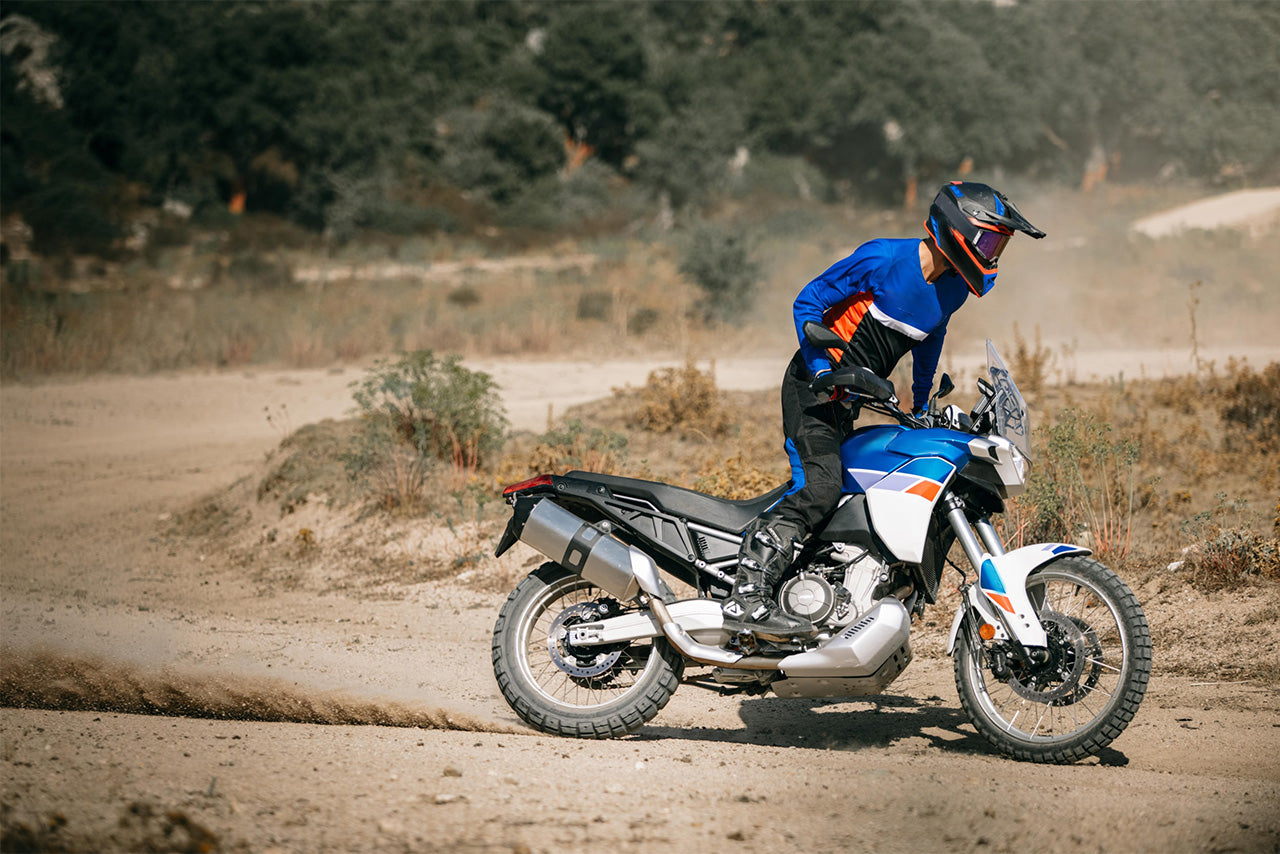 Aprilia Tuareg 660 motorcycle on a dirt trail.
