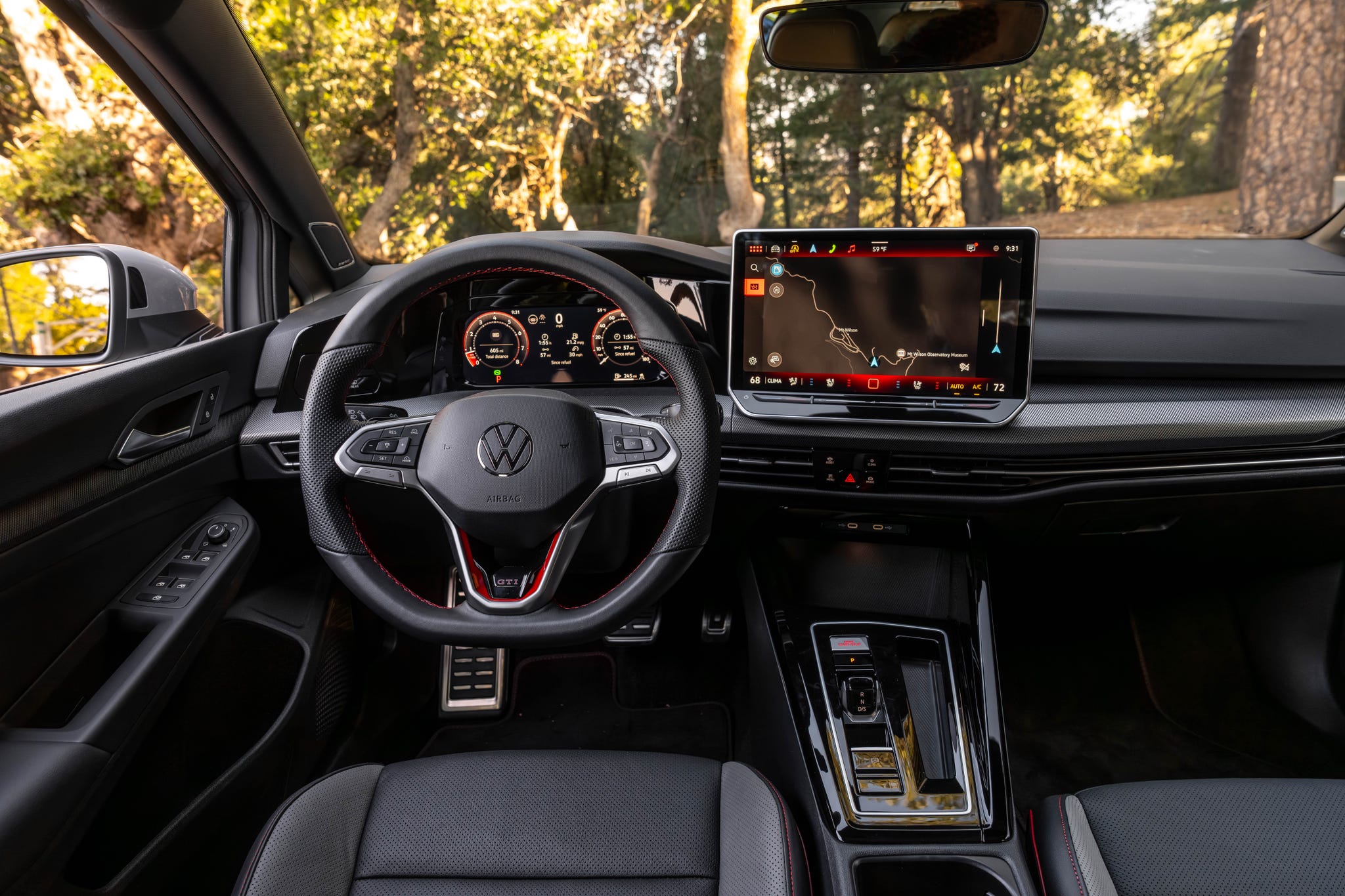 Interior view of the 2026 Volkswagen Golf GTI dashboard.