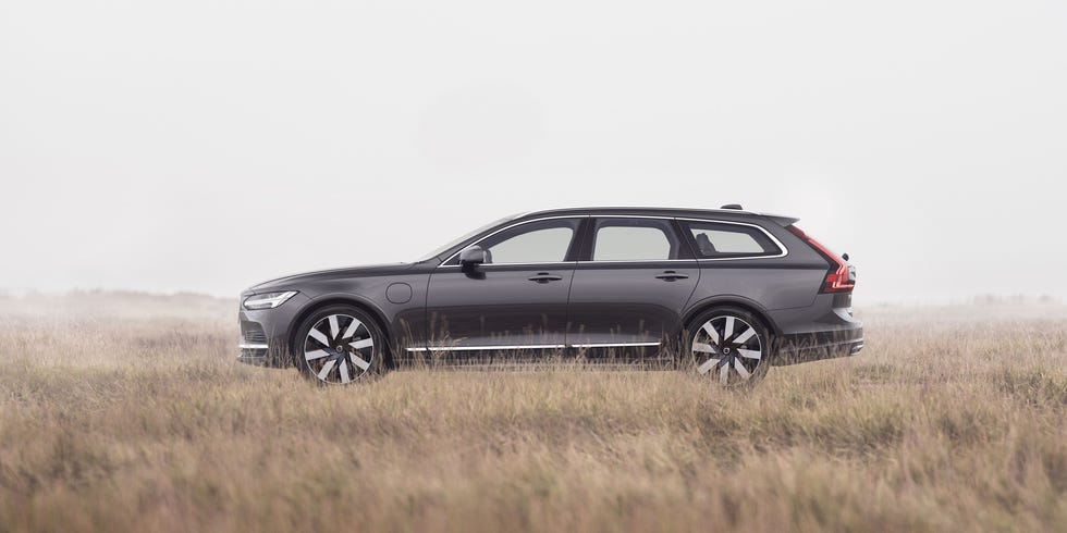 A car parked in a misty field representing Volvo's heritage and outdoor-focused branding.