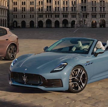 Three luxury Maserati vehicles displayed in a historic Italian cobblestone plaza.