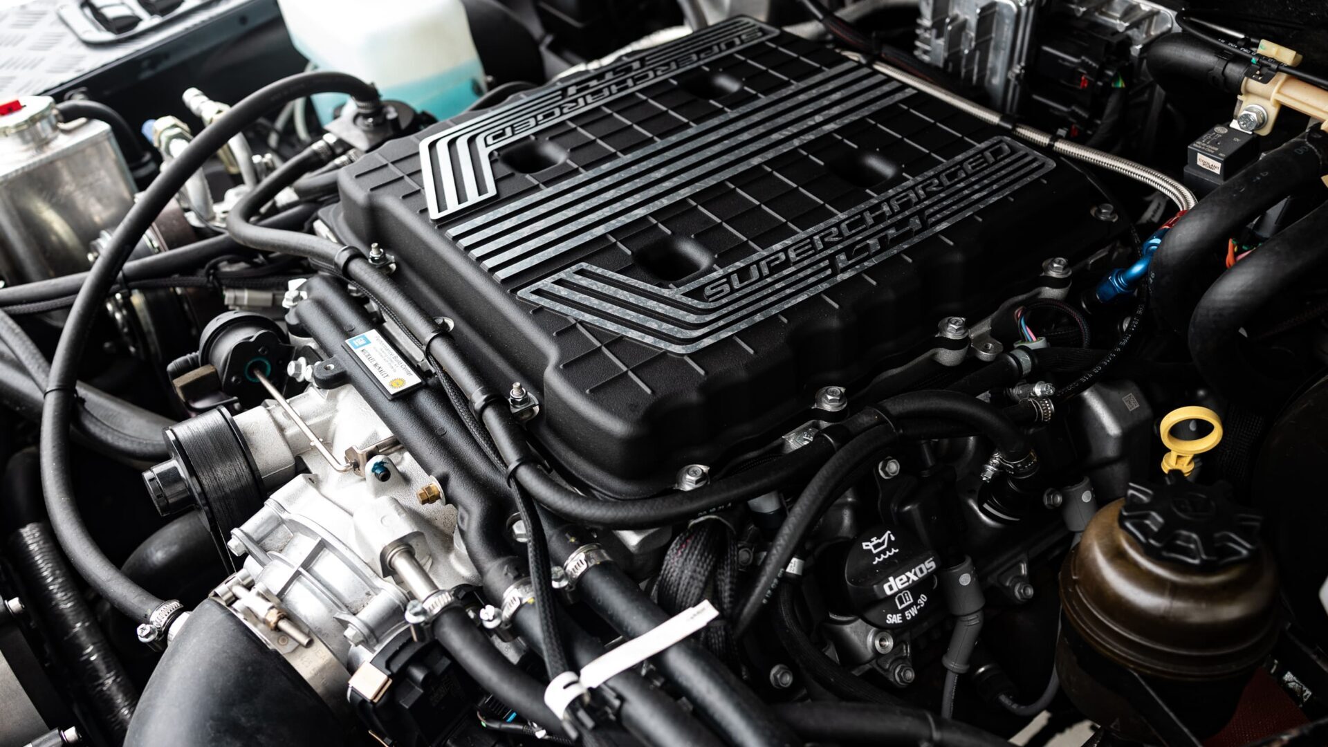 Close up of a high-performance engine bay in a custom Land Rover Defender.